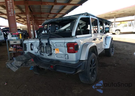 2023 Jeep Wrangler 4Xe Sahara 4X4 z USA, uszkodzony, nr VIN 1C4JJXP63PW641137